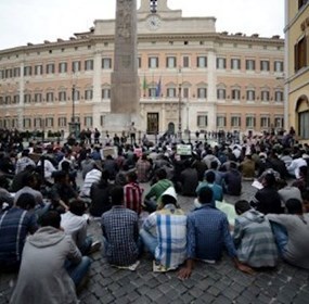 Young-Bangladeshi-immigrants-demonstrate-in-front-of-the-Italian-parliament-in-Rome-on-May-21-2013_-AFP
